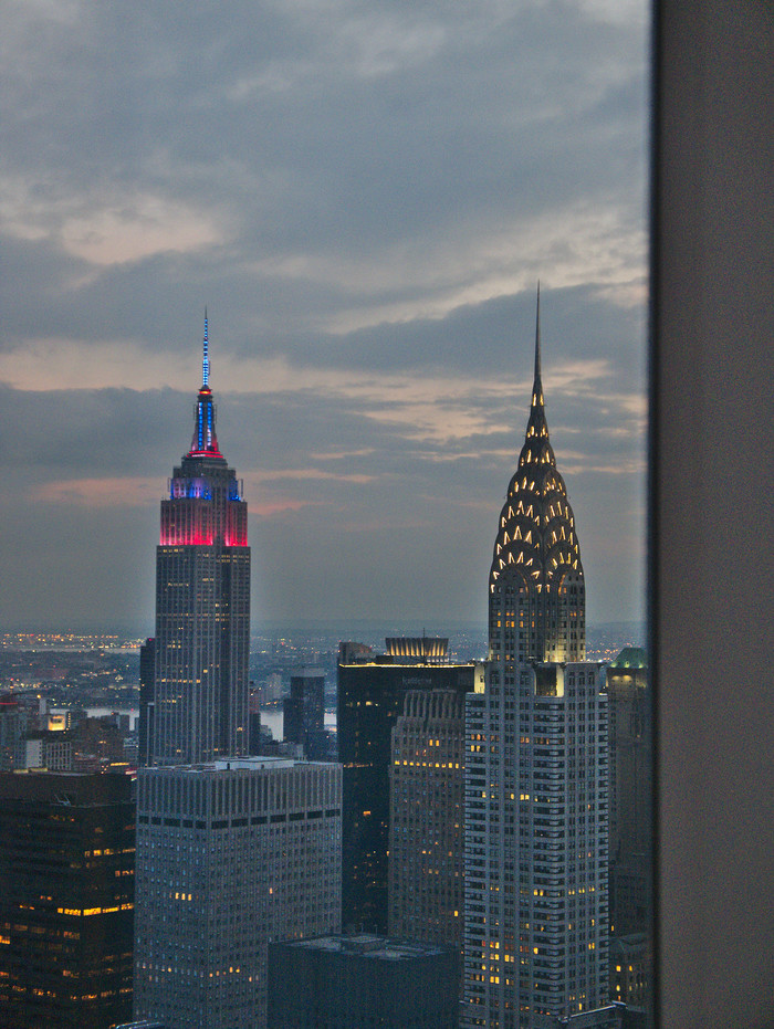 Chrysler and Empire State buildings lit up.