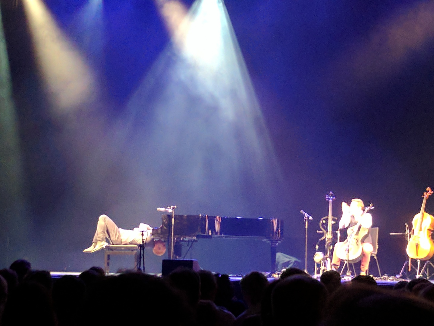 Jon playing with his head under the piano